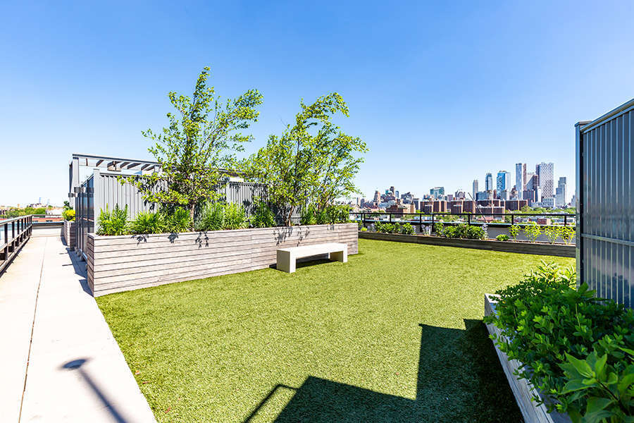 363 Bond Street rooftop lawn with planters and seating for social gatherings