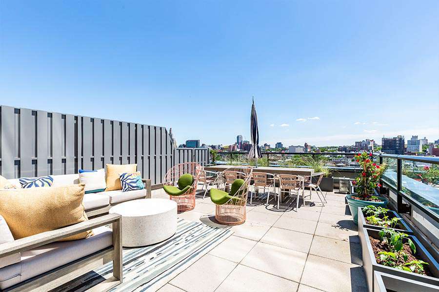 Views of the NYC skyline from the 363 Bond Street Apartments rooftop